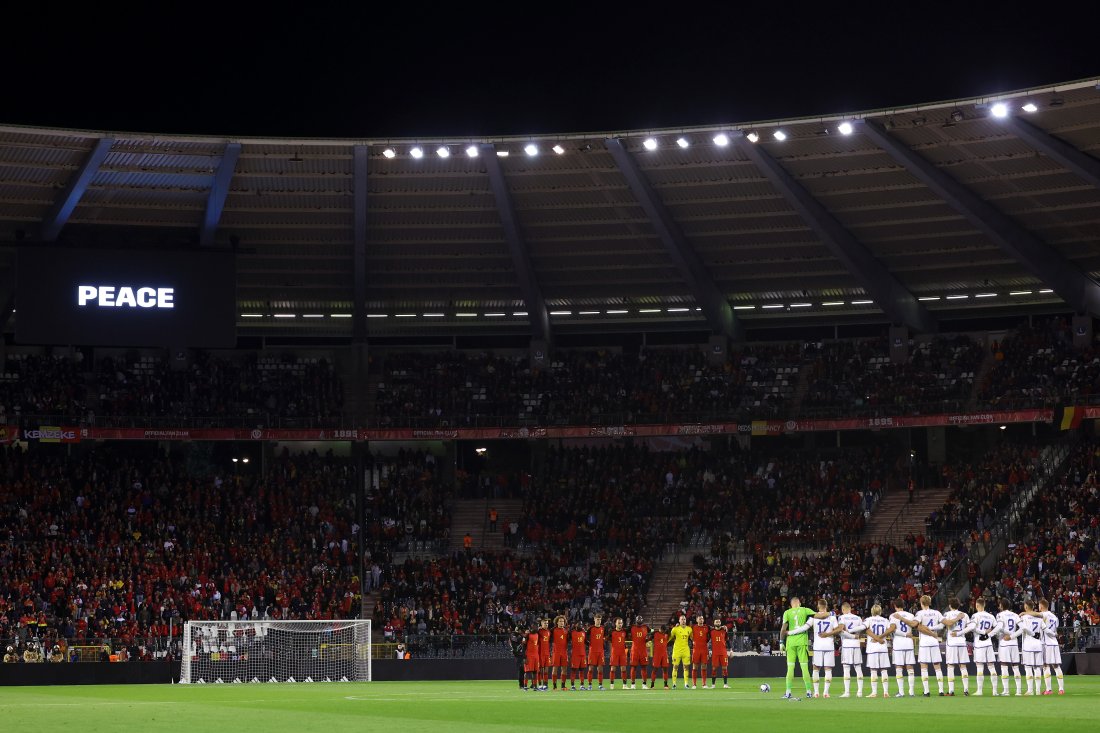 BRUSSELS, BELGIUM - OCTOBER 16: Players, fans and match officials observe a minutes silence prior to the UEFA EURO 2024 European qualifier match between Belgium and Sweden at King Baudouin Stadium on October 16, 2023 in Brussels, Belgium. (Photo by Alexander Hassenstein - UEFA/UEFA via Getty Images)